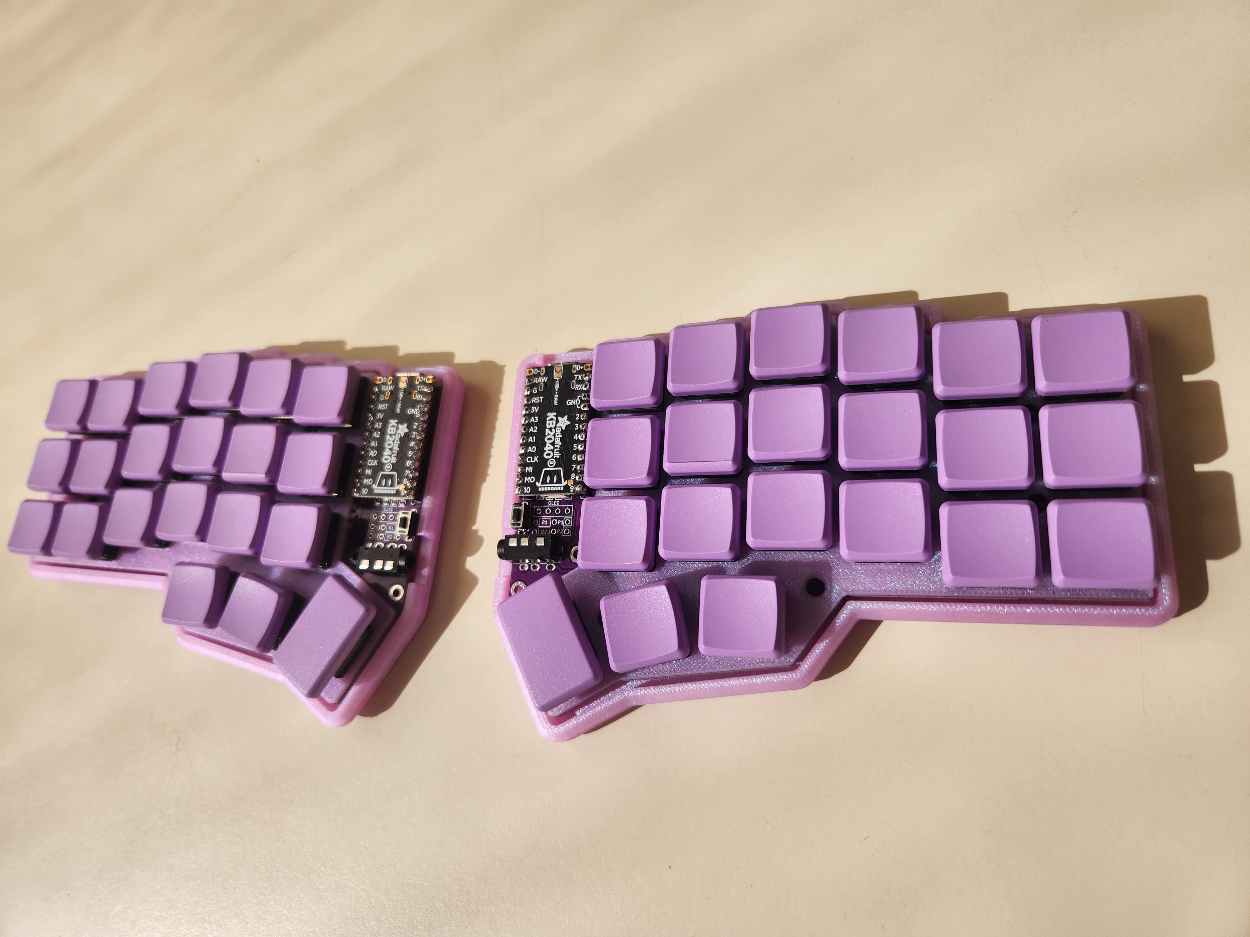 Both halves laying flat on the desk